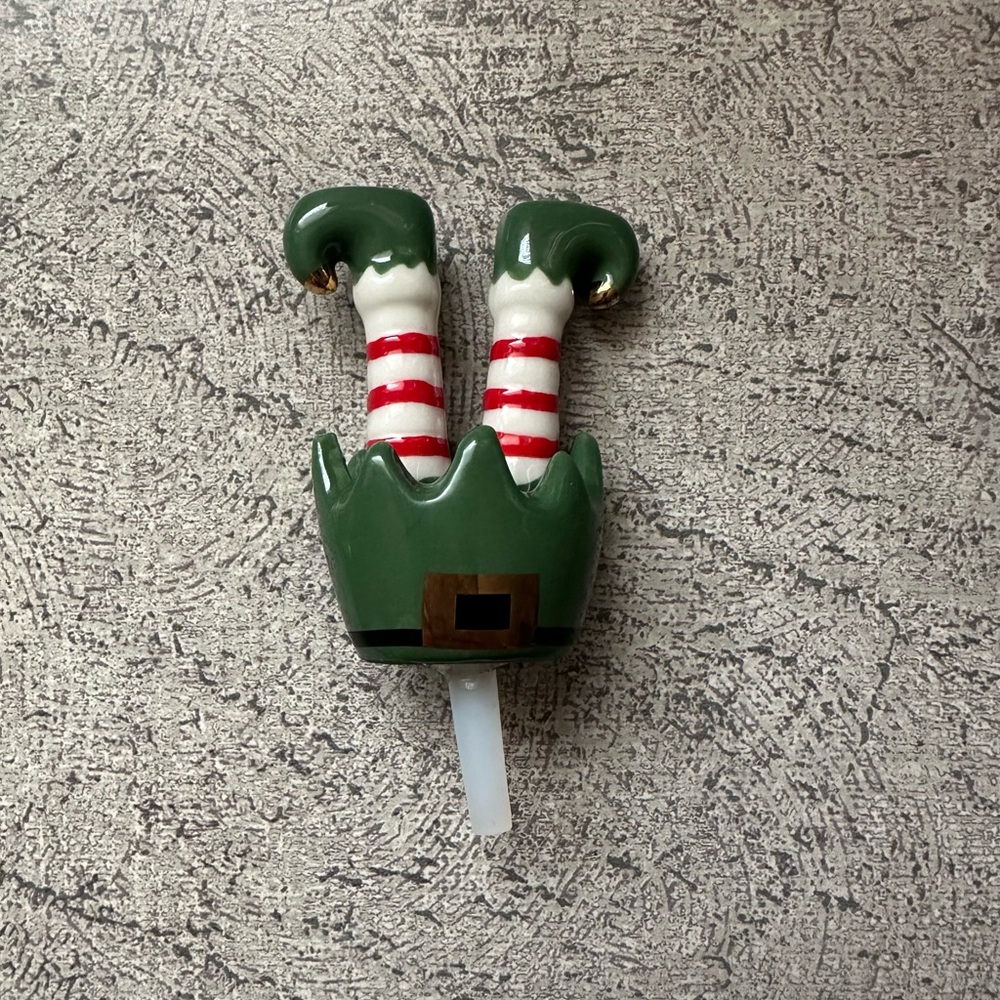 - Nora Fleming retired elf toes